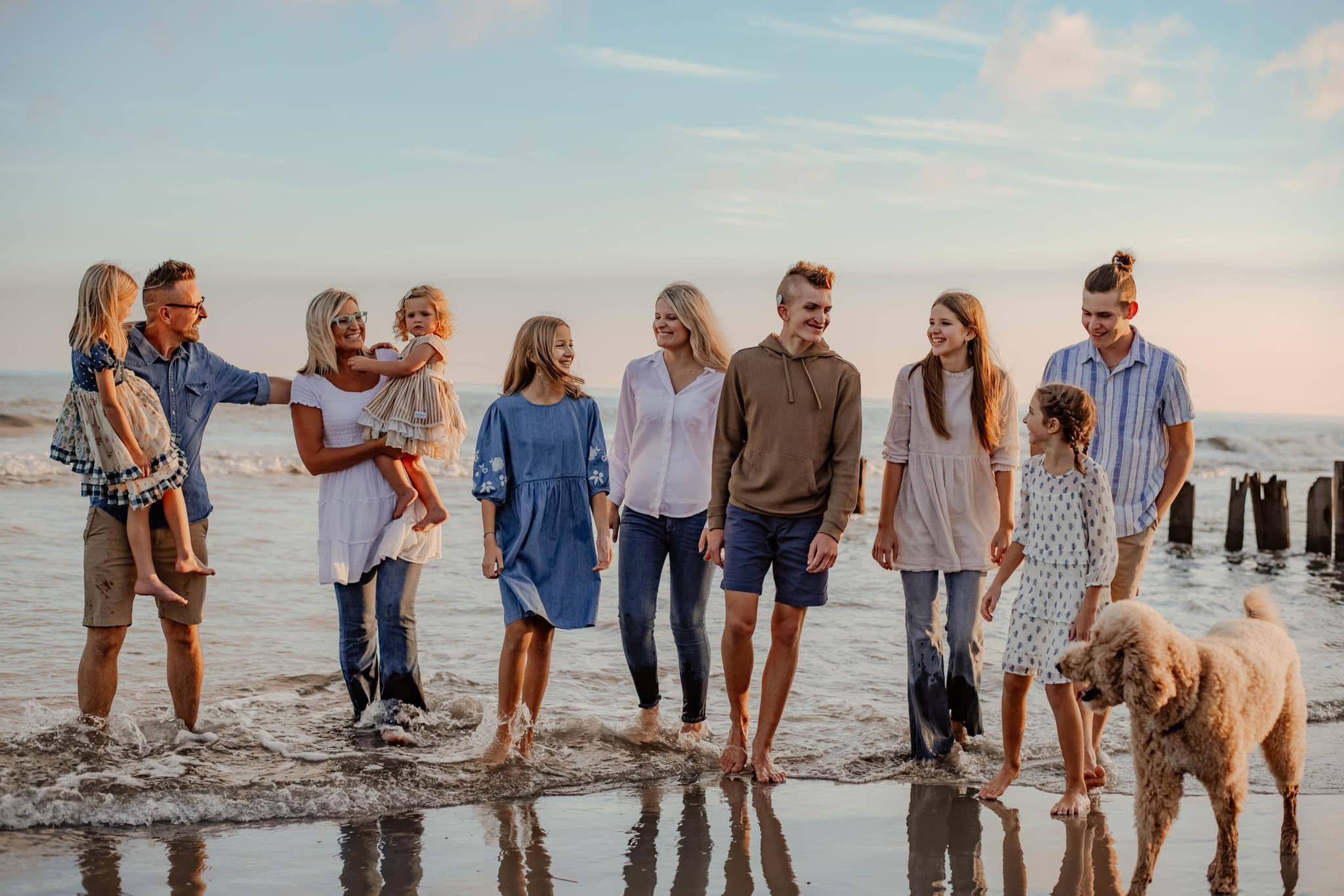 Family laughing outdoors