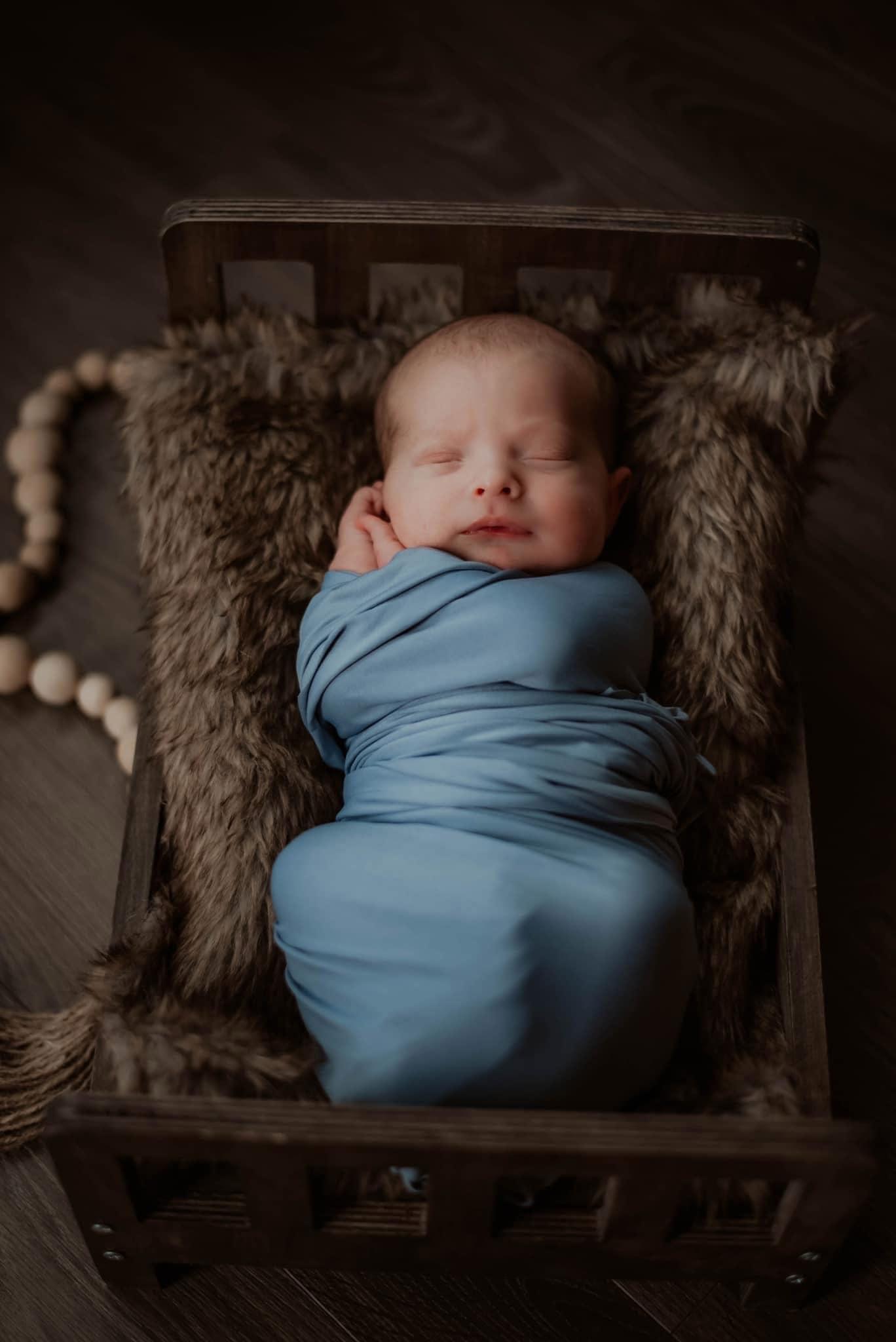 Newborn wrapped portrait